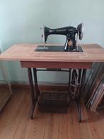 Oude singer naaimachine, Ophalen