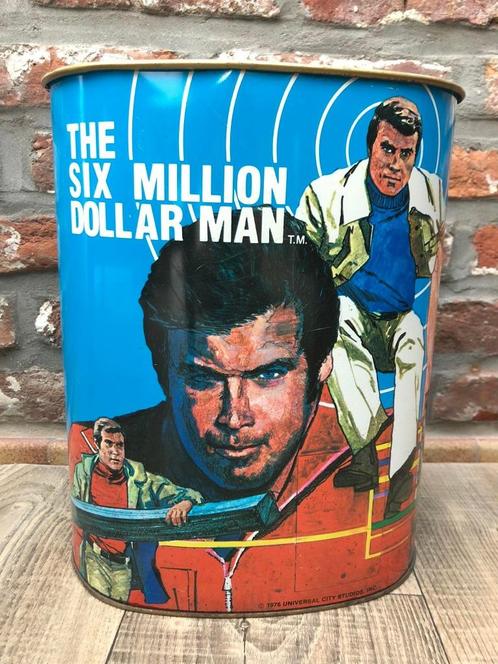 Corbeille The six million dollar man 1976, Verzamelen, Merken en Reclamevoorwerpen, Gebruikt, Reclamebord, Ophalen of Verzenden