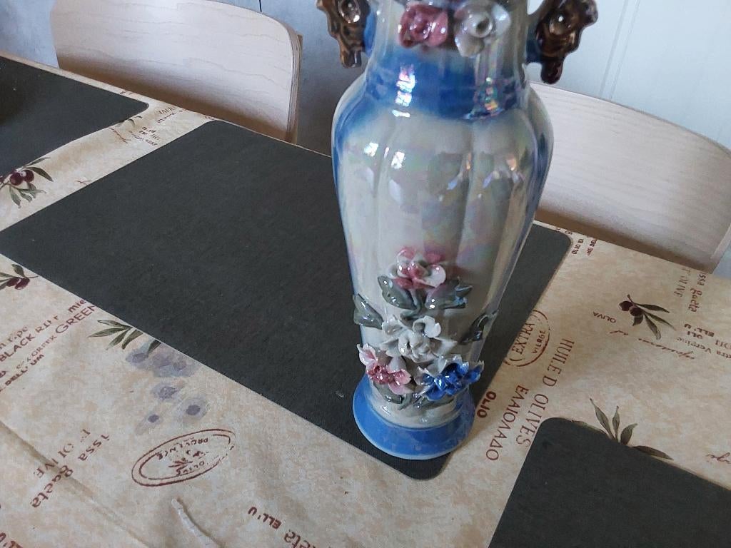 Porseleine vaas, Ophalen