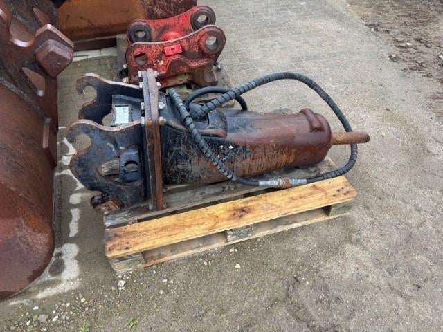 breekhamer Caterpillar H65, Ophalen, Graafmachine