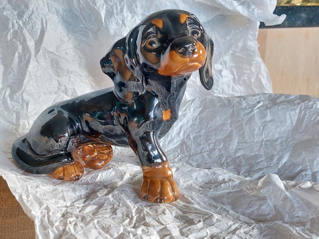 Lief beeldje van teckel, Ophalen