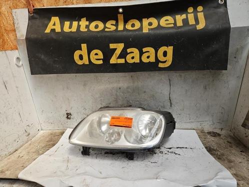 Koplamp links van een Volkswagen Touran, Auto-onderdelen, Verlichting, Volkswagen, Gebruikt, 3 maanden garantie, Ophalen of Verzenden