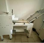 Brood snijden machine gestolen, Ophalen