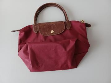 petit longchamp disponible aux enchères