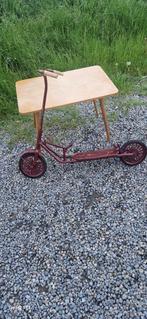 Oude scooter., Ophalen