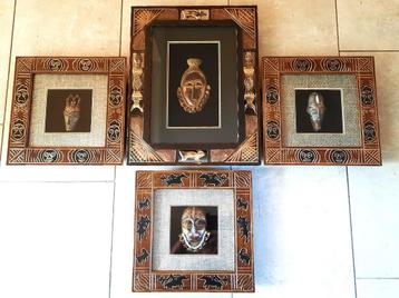 Zeer mooi Afrikaanse set van 4 houten wandkaders met maskers beschikbaar voor biedingen