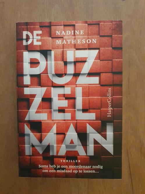 Nadine Matheson - De puzzelman, Boeken, Thrillers, Zo goed als nieuw, Ophalen of Verzenden