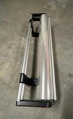 papierrolhouder, Ophalen