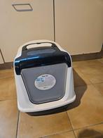 Kattenbak met klep, Ophalen