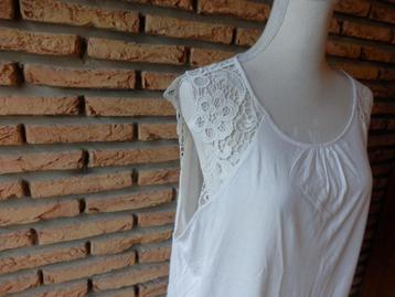 (121)- top femme t.42 blanc - H&M - beschikbaar voor biedingen