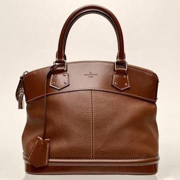 Handtas Louis Vuitton. Ook Delvaux te koop.