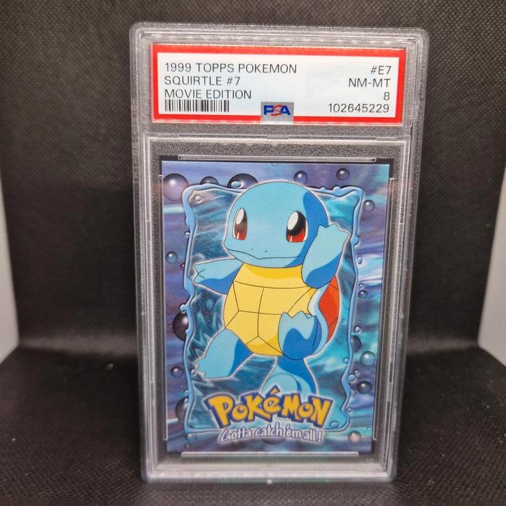Squirtle #7 Movie Edition Topps PSA 8, Hobby en Vrije tijd, Verzamelkaartspellen | Pokémon, Ophalen of Verzenden