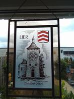 Brand glasraam met Zimmertoren. Lier., Ophalen