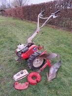 Kubota T550 trekker met kantelploeg., Bricolage & Construction, Outillage | Fraiseuses, Enlèvement