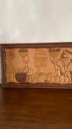 Hand gesneden africaans houtsnijwerk, Ophalen