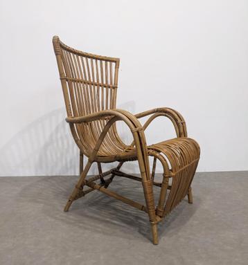 Vintage fauteuil van rotan beschikbaar voor biedingen