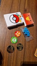Pokemon  muntjes en karton doosje, Hobby en Vrije tijd, Gebruikt, Ophalen