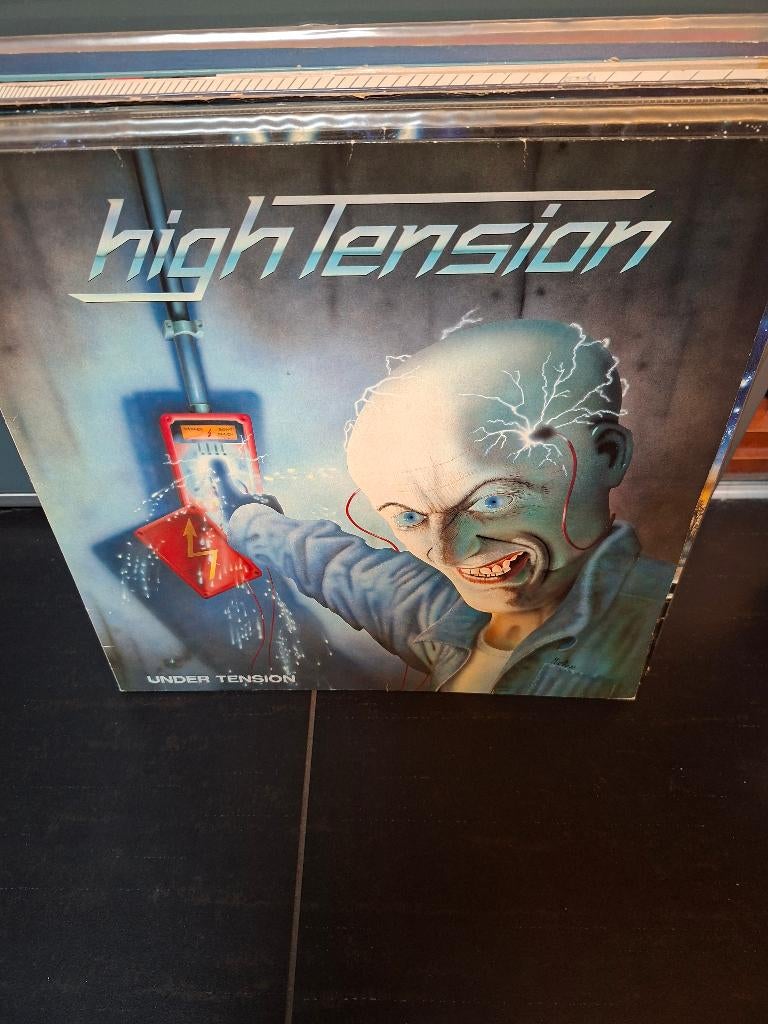 lp - high tension - under tension, Cd's en Dvd's, Vinyl | Hardrock en Metal, Gebruikt, 1980 - 1989, Ophalen of Verzenden, Inclusief binnenhoes