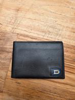 Delvaux portemonnee, Ophalen