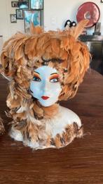 Porseleinen hoofd met pluimen, Ophalen, Gebruikt