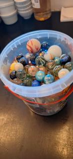 Knikkers gratis, Ophalen