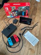 Nintendo Switch Rood/Blauw + 2 Joy-Con controllers, Games en Spelcomputers, Spelcomputers | Nintendo Switch, Ophalen, Gebruikt