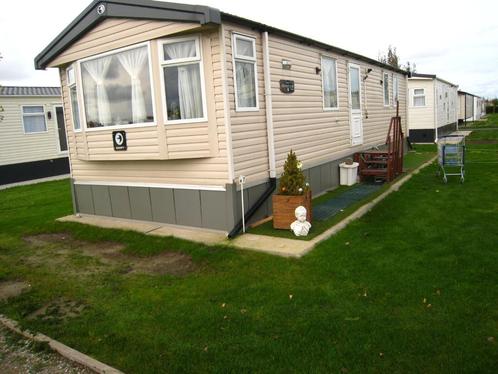 caravan te koop, Caravans en Kamperen, Caravans, Particulier, tot en met 6, 2000 kg en meer, Standaardzit, Swift, 2 aparte bedden