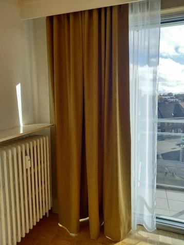 Lange overgordijnen beschikbaar voor biedingen