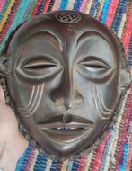 Afrikaans masker, Ophalen