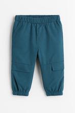 Next broek, blauwgroen/petrol, maat 86, ongedragen (nieuw!), Kinderen en Baby's, Ophalen, Broekje, Jongetje of Meisje, Nieuw