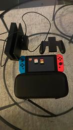 Weinig gebruikt nintendo switch (rood en blauw), Games en Spelcomputers, Ophalen, Zo goed als nieuw