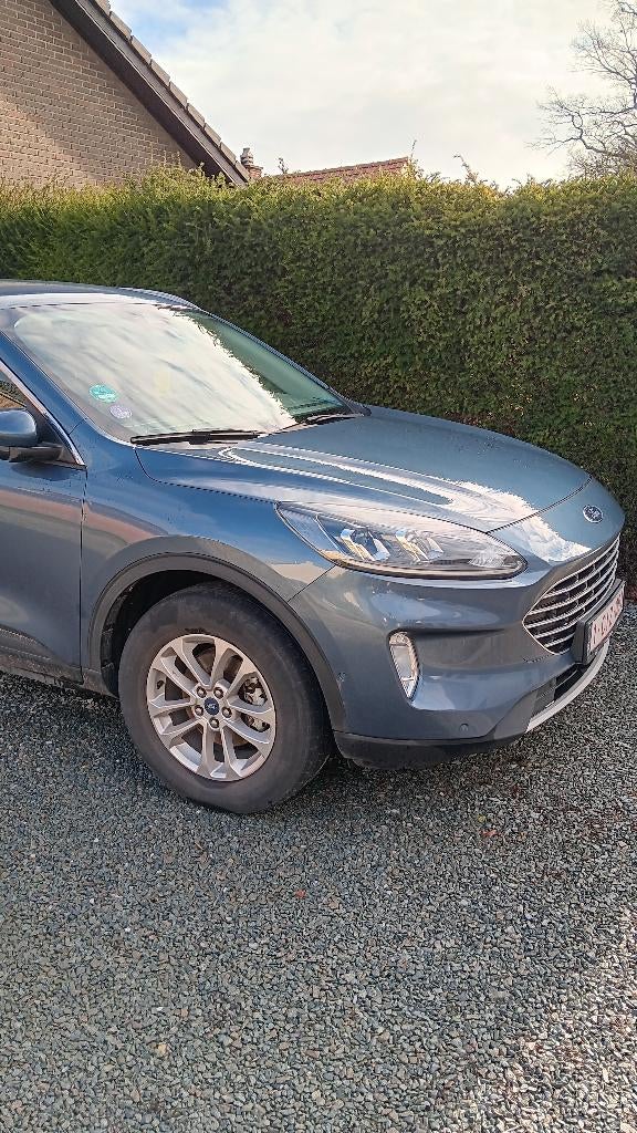 Te koop Ford Kuga Plugin Hybride, Auto's, Automaat, Stof, Zwart, Blauw