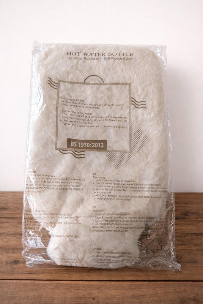 Bouillotte en tissu doux (neuve dans son emballage), Enlèvement