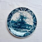 Groot bord in Delfts blauw, Ophalen