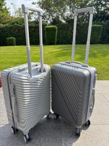 Trolley - reiskoffer (2x) - 55cm x 35cm x 25cm - als NIEUW  beschikbaar voor biedingen
