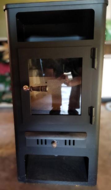 hout- en briketkachel beschikbaar voor biedingen