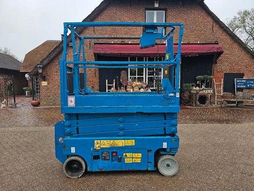 Genie Gs1932 hoogwerker 2013 Joystick bediening Goede accu, Zakelijke goederen, Machines en Bouw | Liften, Steigers en Ladders