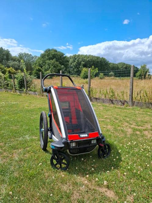 Thule Cross single red, Fietsen en Brommers, Fietsaccessoires | Aanhangwagens en Karren, Gebruikt, Kinderkar, Vering, Opvouwbaar