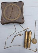 Antieke wandklok Junghans met pendels, Ophalen