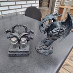 Drakenbeeld en zout peper vat, Ophalen