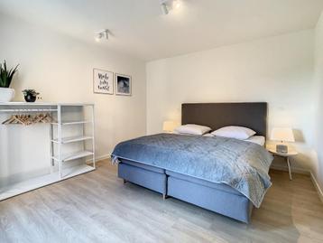 Boxspring 2persoon 180*200 Grijs met hoofdboard beschikbaar voor biedingen