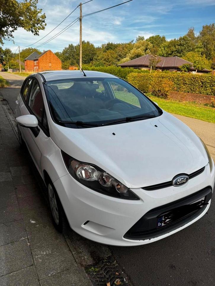 Ford Fiesta  diesel 2011, Auto's, Ford, Particulier, Fiësta, Diesel, Euro 5, Stadsauto, 5 deurs, Handgeschakeld, Wit, Grijs, Stof