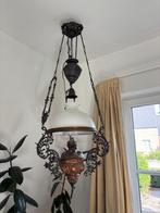 olielampen, Enlèvement