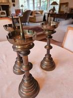 Koperen kandelaars, Ophalen