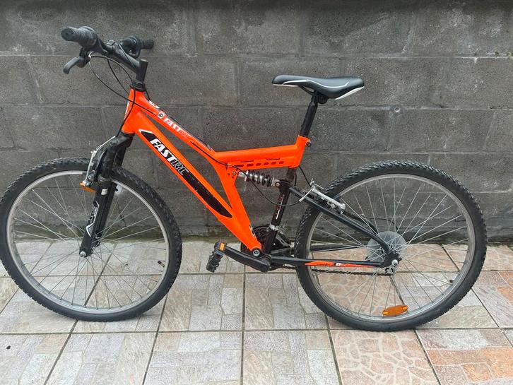 Oranje fiets met 6 versnellingen, Fietsen en Brommers, Fietsen | Mountainbikes en ATB, Zo goed als nieuw, Heren, Overige merken