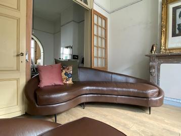 2 gespiegelde lederen zetels beschikbaar voor biedingen