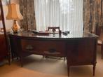 bureau acajou, Ophalen