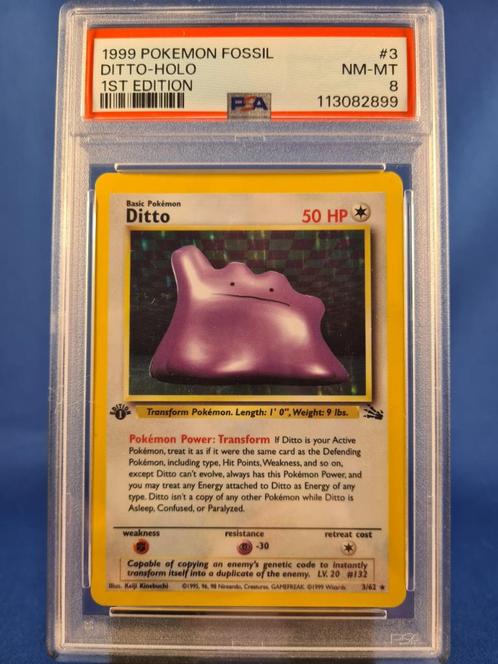 Ditto 3/62 - Fossil (1st edition) (PSA 8), Hobby en Vrije tijd, Verzamelkaartspellen | Pokémon, Gebruikt, Verzenden