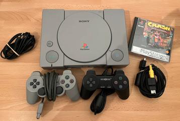 Playstation 1 met 2 controllers en alle kabels en game 📺🎮 disponible aux enchères