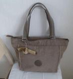 Beige hand- of schoudertas + aap, Handtassen en Accessoires, Tassen | Damestassen, Ophalen of Verzenden, Gebruikt, Beige, Handtas